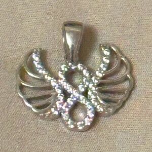 NWOT – 925 Sterling silver & small round rhinestone infinity pendant with wings